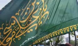 اهتزاز پرچم مزین به نام امام رضا(ع) در بروجرد
