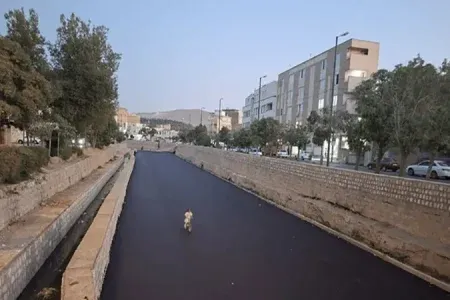 عملیات آسفالت بستر رودخانه الیگودرز متوقف شد